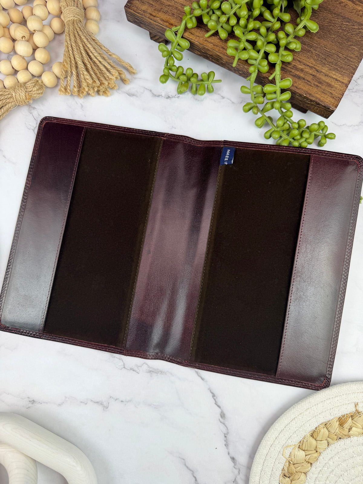 Girologio A5 Leather Notebook Cover in Oxblood, open showing the velvet liner