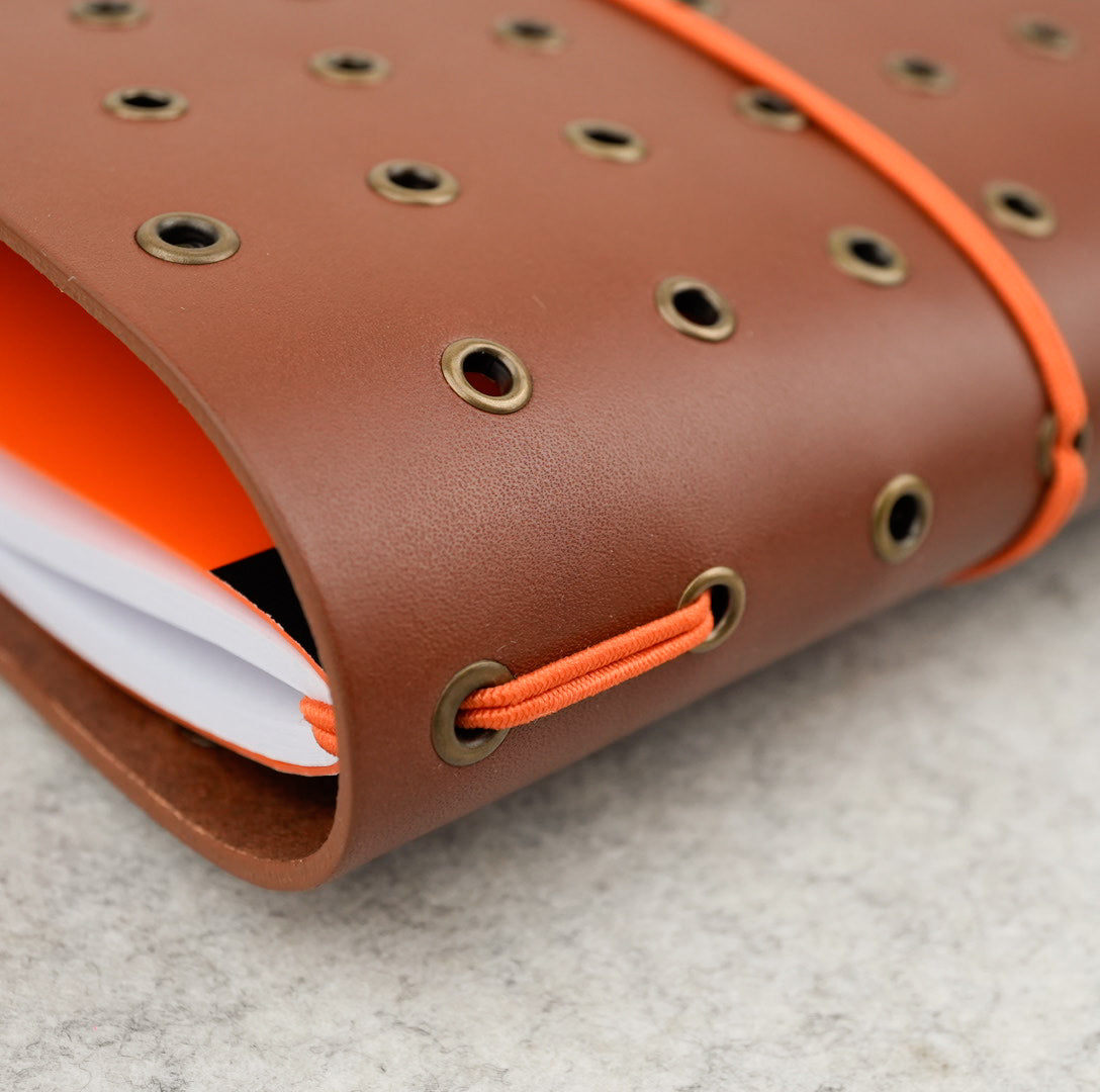 Imperfect Concepts Niko Leather Notebook - B6 Trifold - Chocolate w/ Brass Grommets