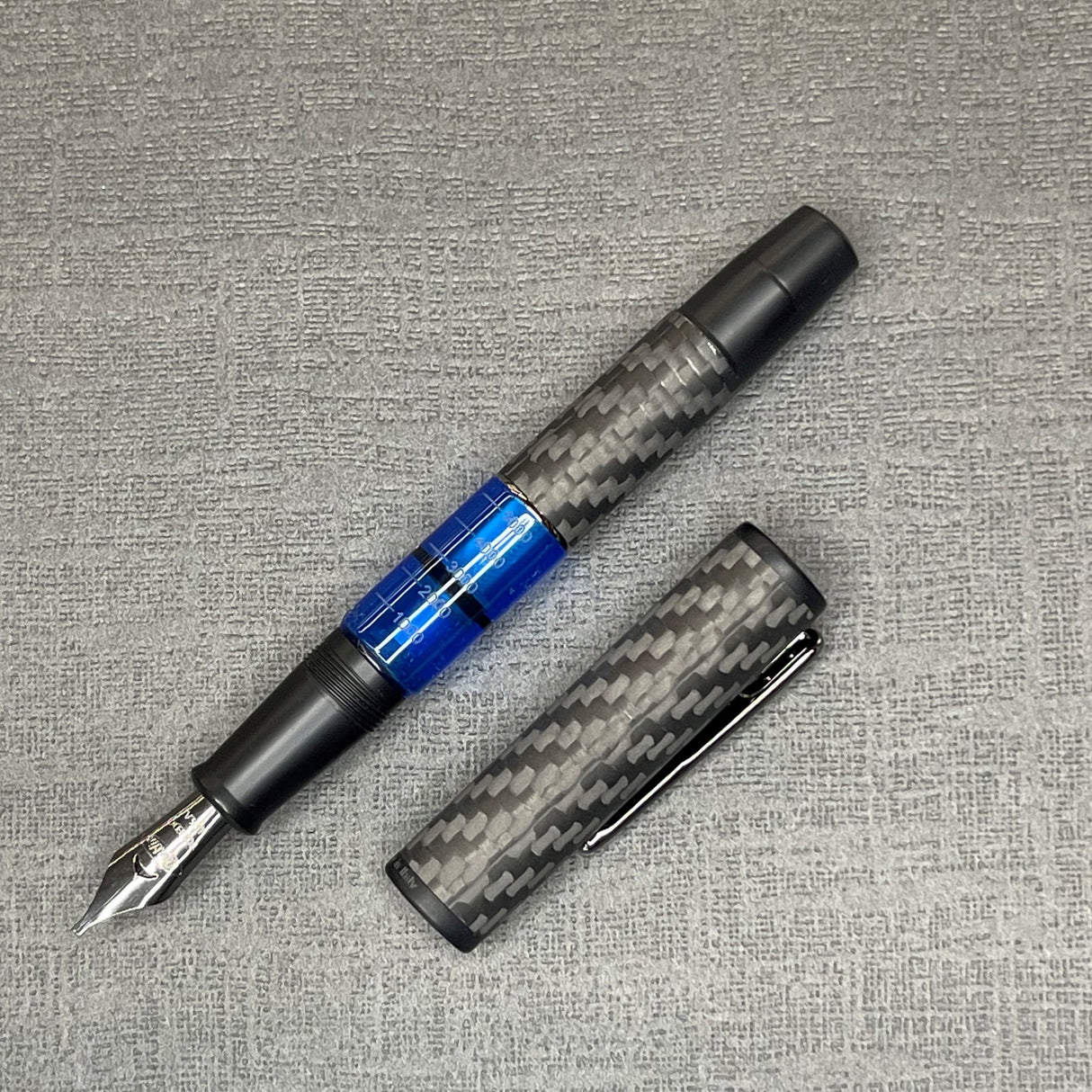 Conklin Carbon Fiber Stealth Word Gauge Fountain Pen - Blue | Atlas Stationers.