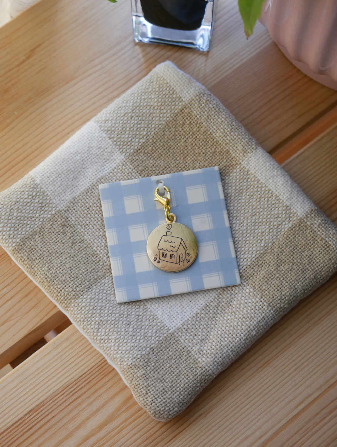 dana ate oatmeal! "stay a while" brass charm