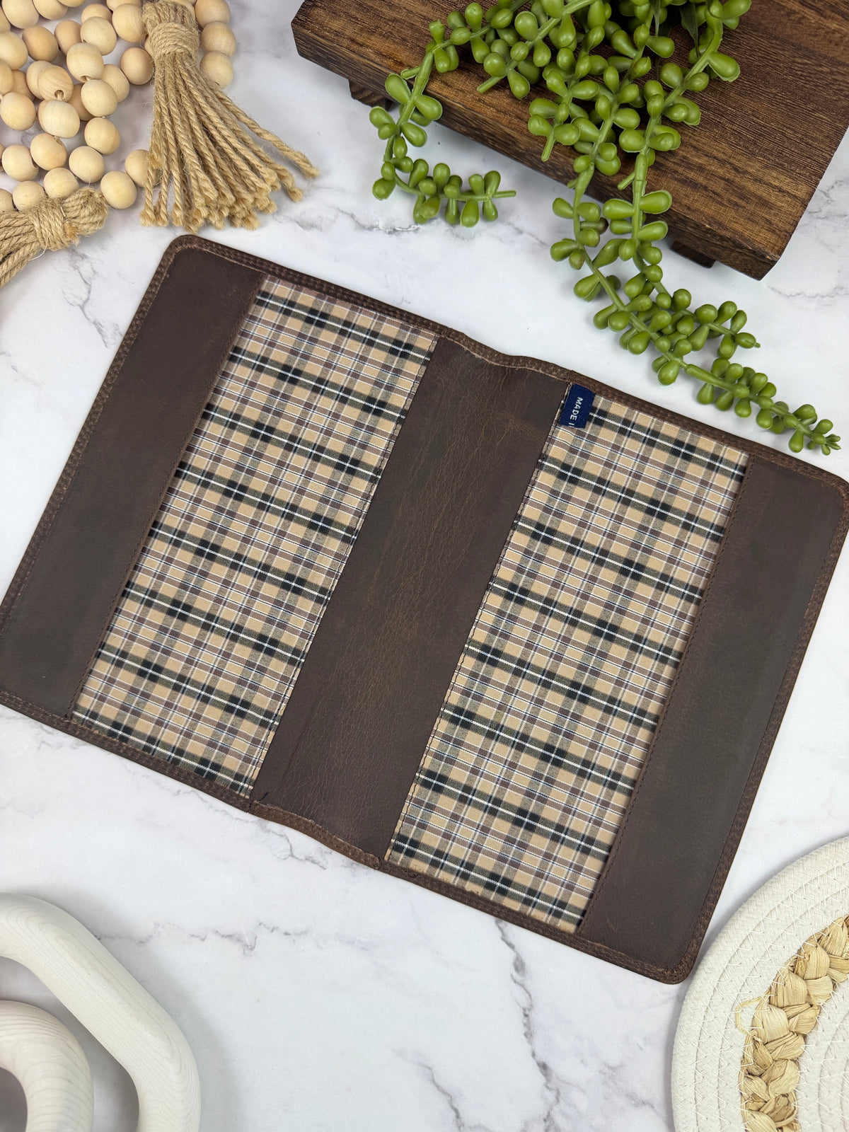 Girologio A5 Leather Notebook Cover in Bomber Brown, open showing the plaid liner