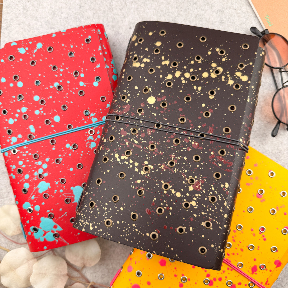 Imperfect Concepts Dancer Leather Notebook - A5 Trifold - Painted Red w/ Gunmetal Grommets