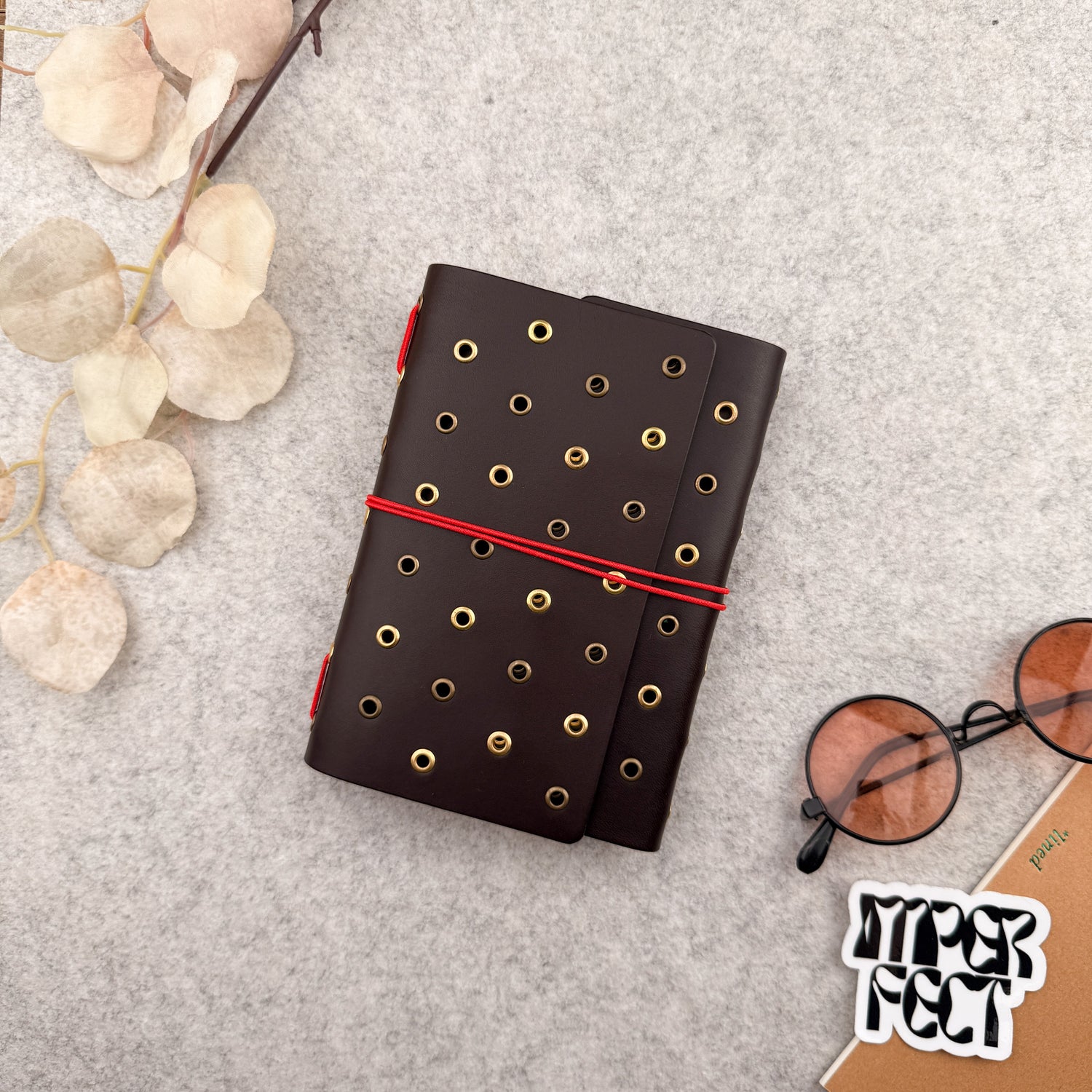 Imperfect Concepts Juniper Leather Notebook - A6  Trifold - Dark Brown w/ Gold & Brass Grommets