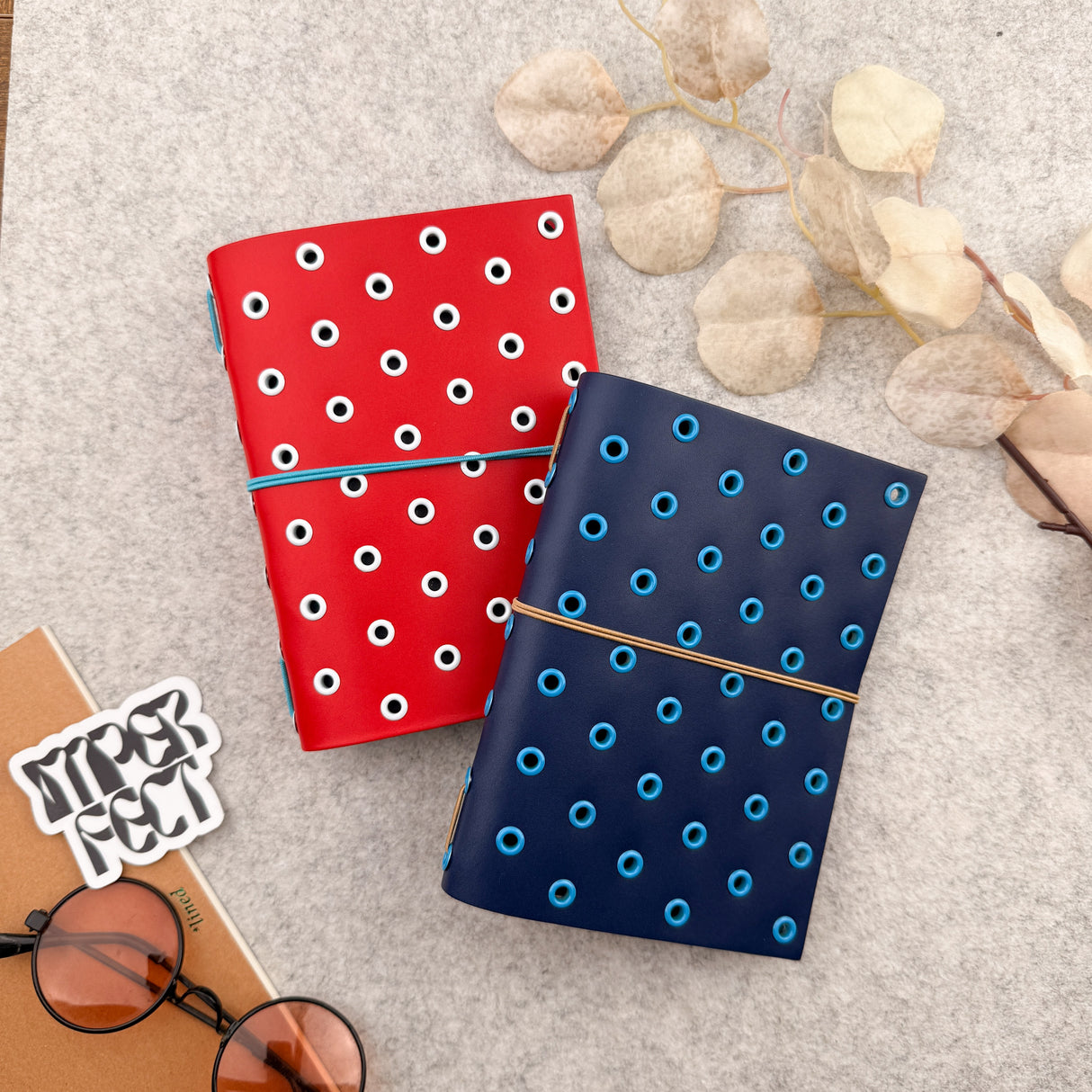 Imperfect Concepts Max Leather Notebook - A6 Bifold - Scarlet w/ White Grommets